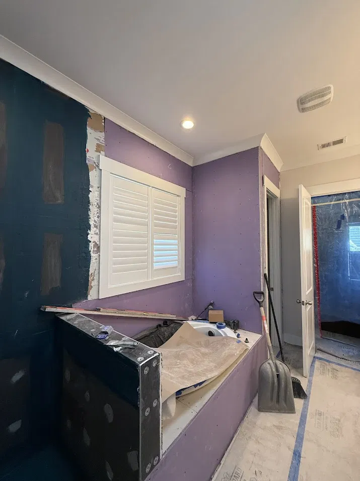 Waterproofing membrane installation during bathroom renovation by CNB Renovations